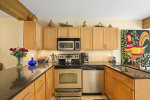 The well-equipped kitchen provides all the comforts of cooking in your own home